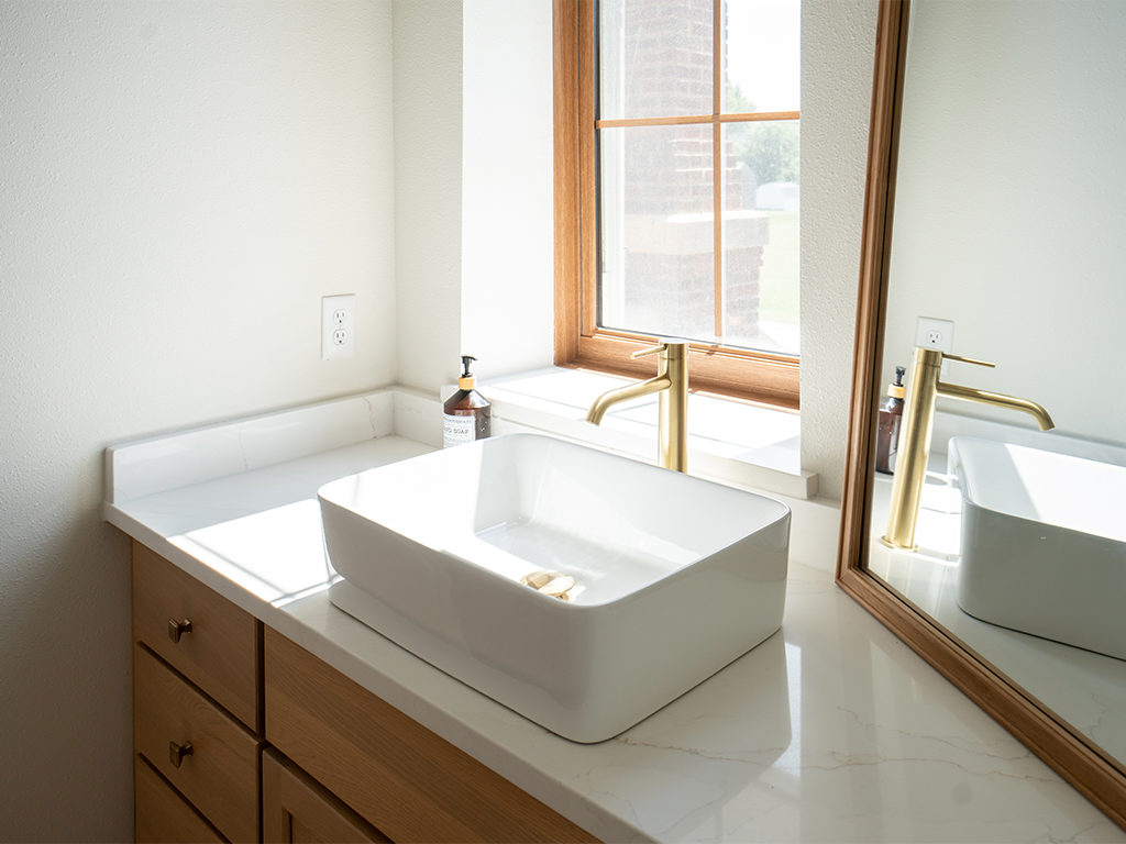 Spa-Inspired Guest Bath: White quartz bathroom vanity with vessel sinks in Central Iowa - Quartz Impressions
