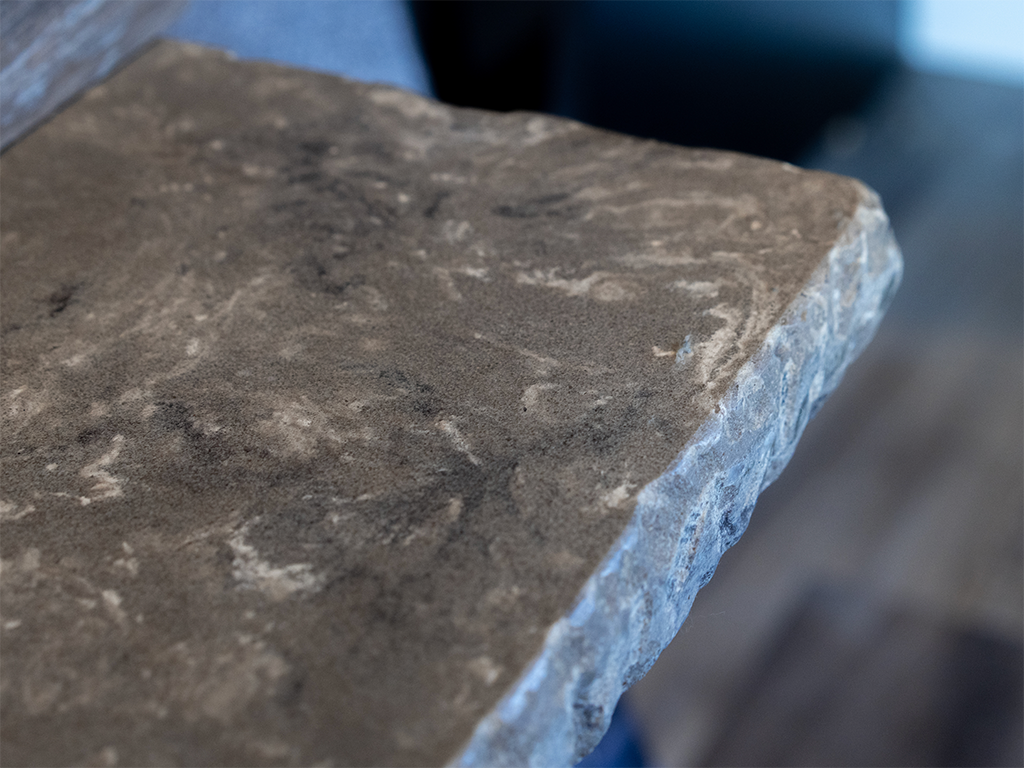 Custom Edge Profile Detail: Chiseled edge profile detail on custom quartz fabrication in Carroll, IA - Quartz Impressions