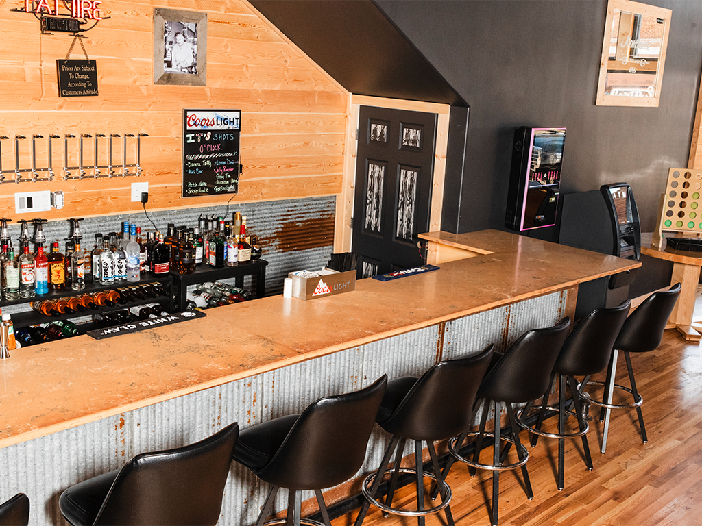 Bold Restaurant Bar: Custom colorful quartz commercial bar top in Coon Rapids, IA - Quartz Impressions