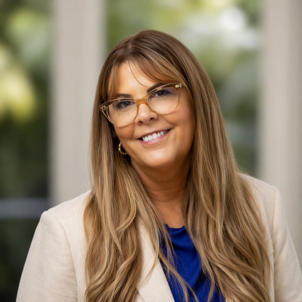 A professional headshot of Carolyn Banks.