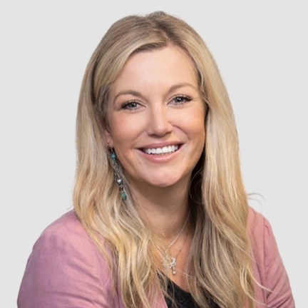 A professional headshot of Karly Boast.