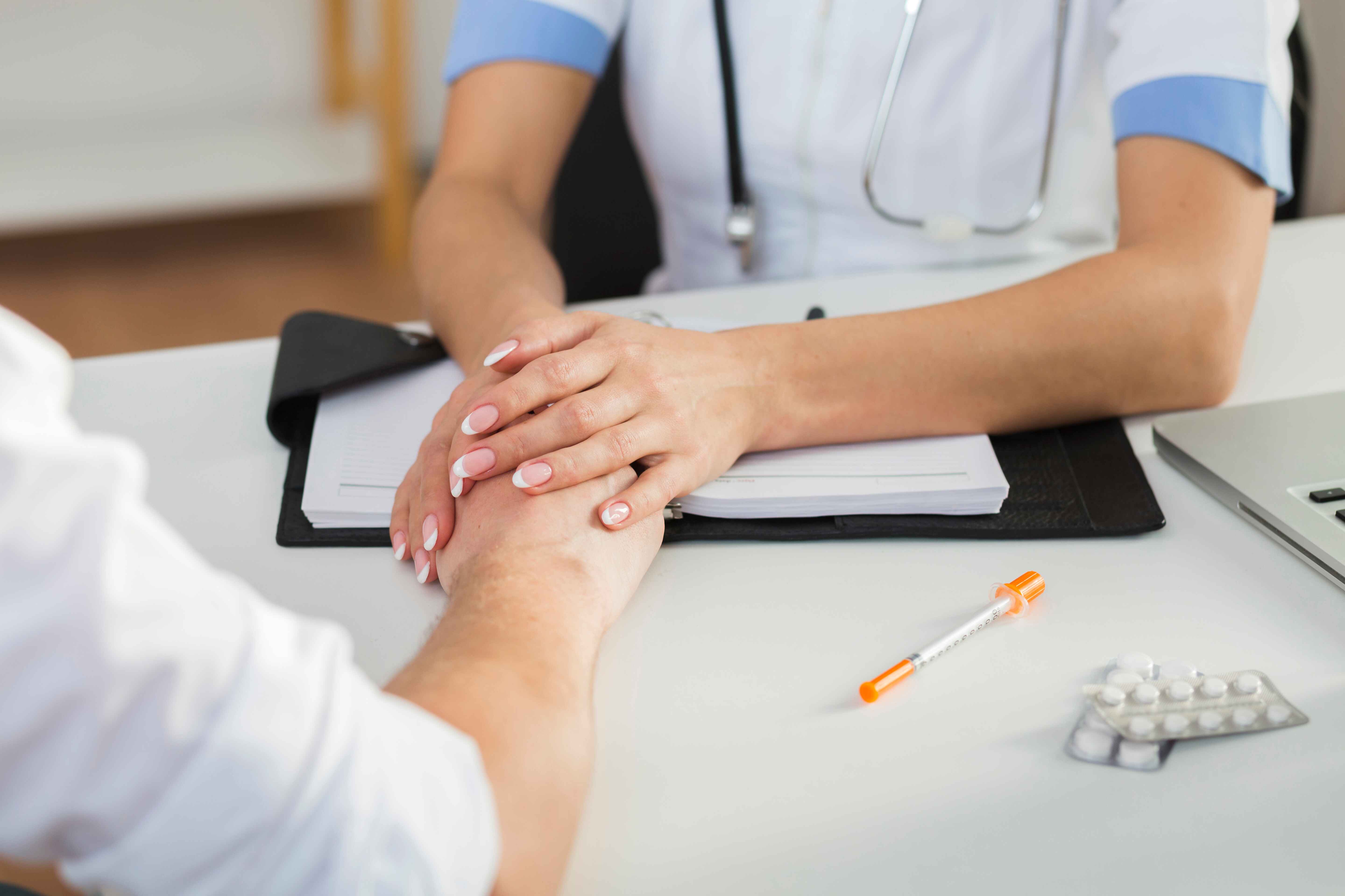 Doctor and patient in consultation at Elev8 Centers