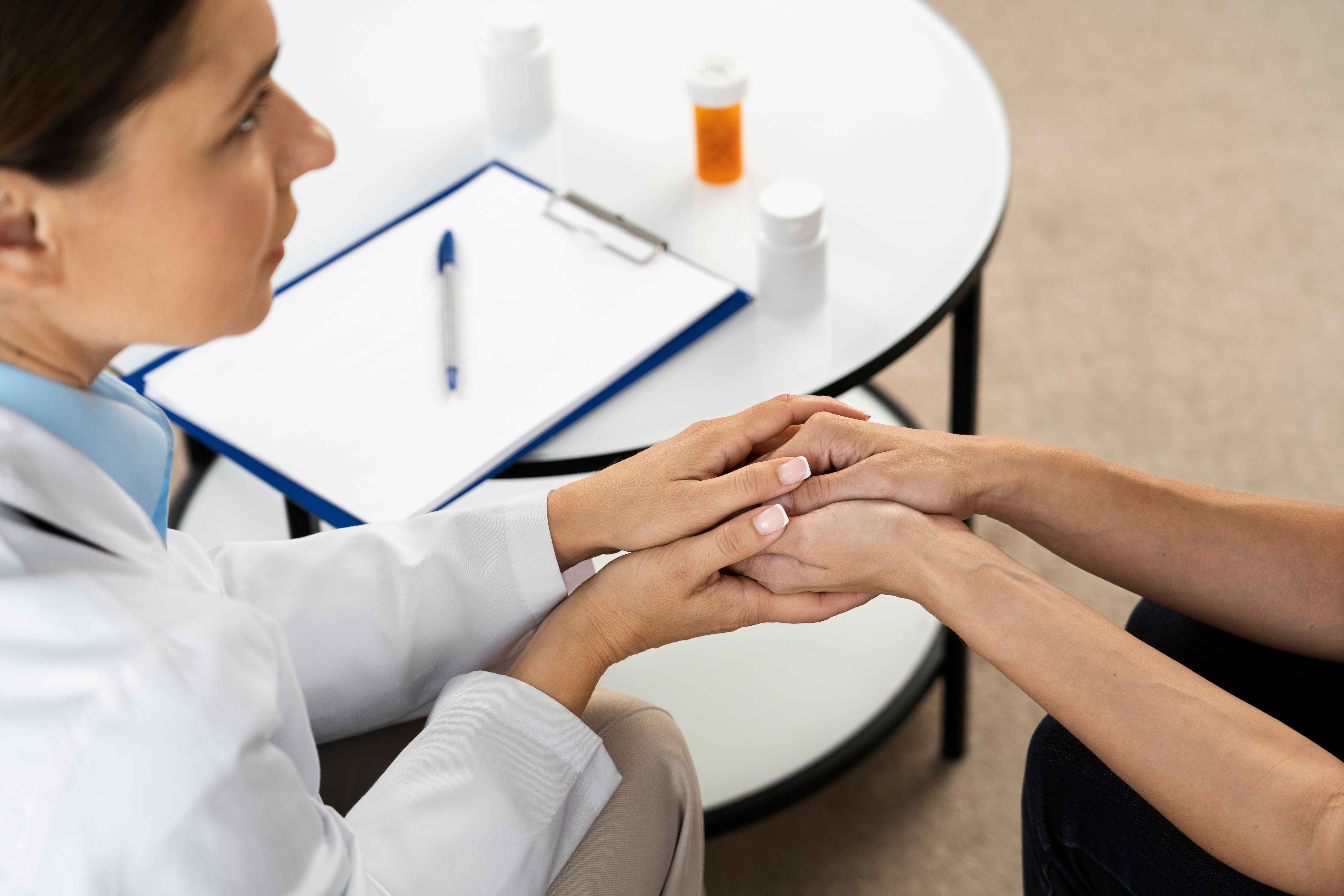 Doctor supporting a patient during dual diagnosis care