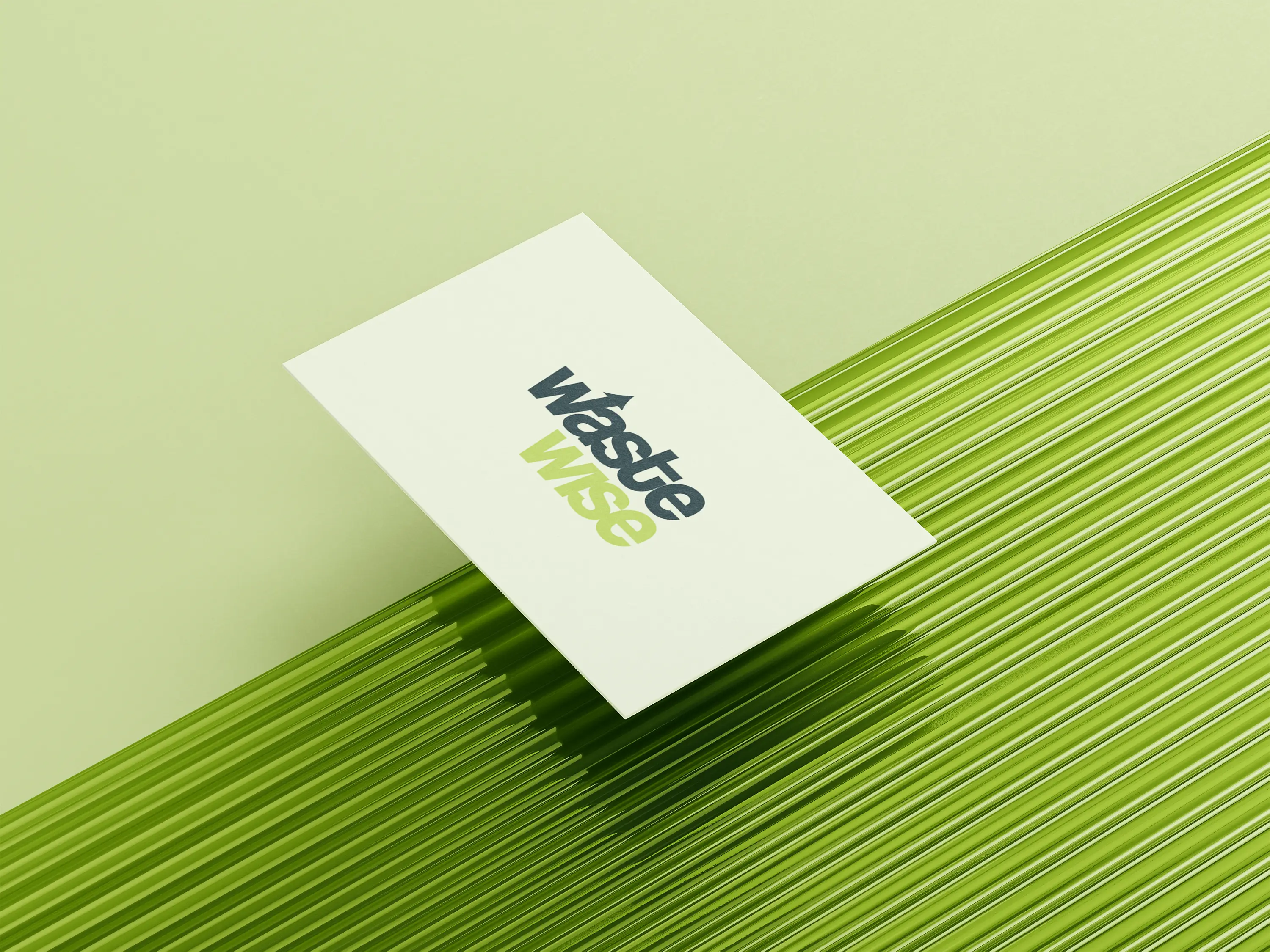 WasteWise's new business cards against a green background