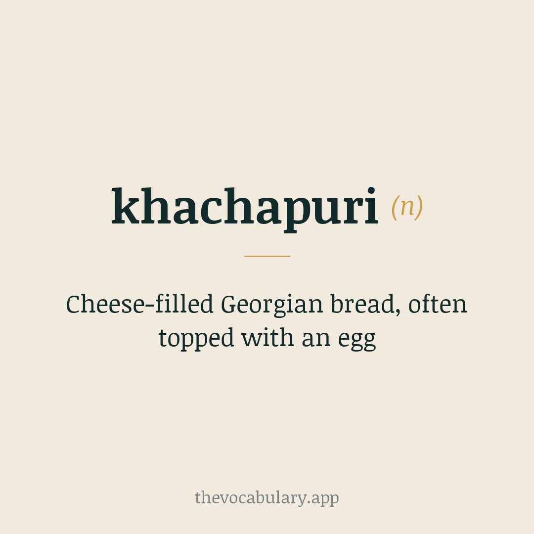 Cheese-filled Georgian bread, often topped with an egg — From Georgian 'khacho' (curd) + 'puri' (bread).