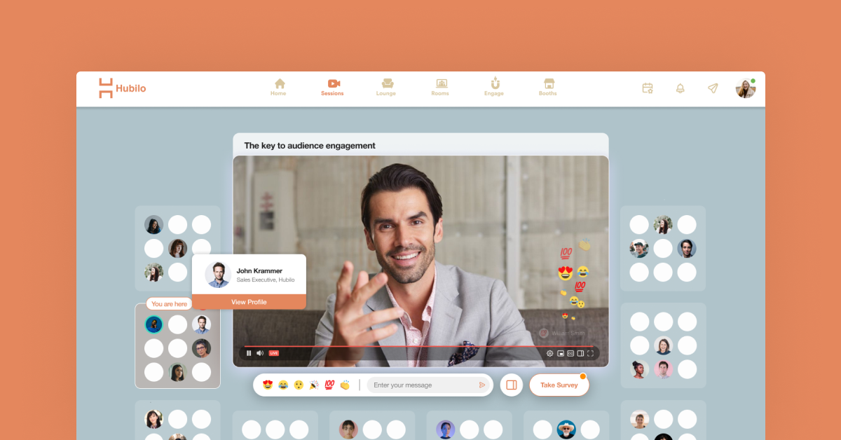 central session screen featuring a speaker, and surrounding attendee tables
