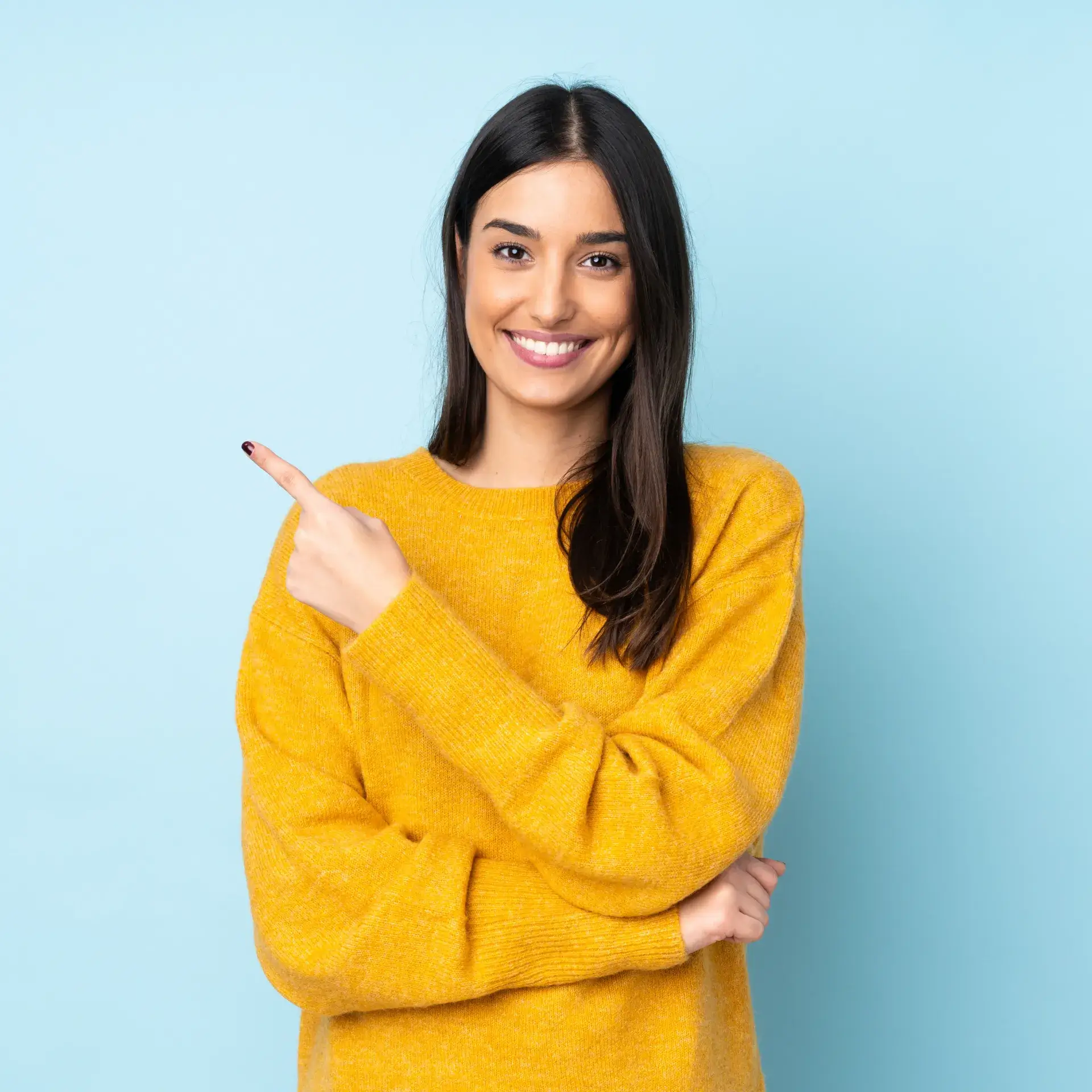 a woman pointing to the side with her finger