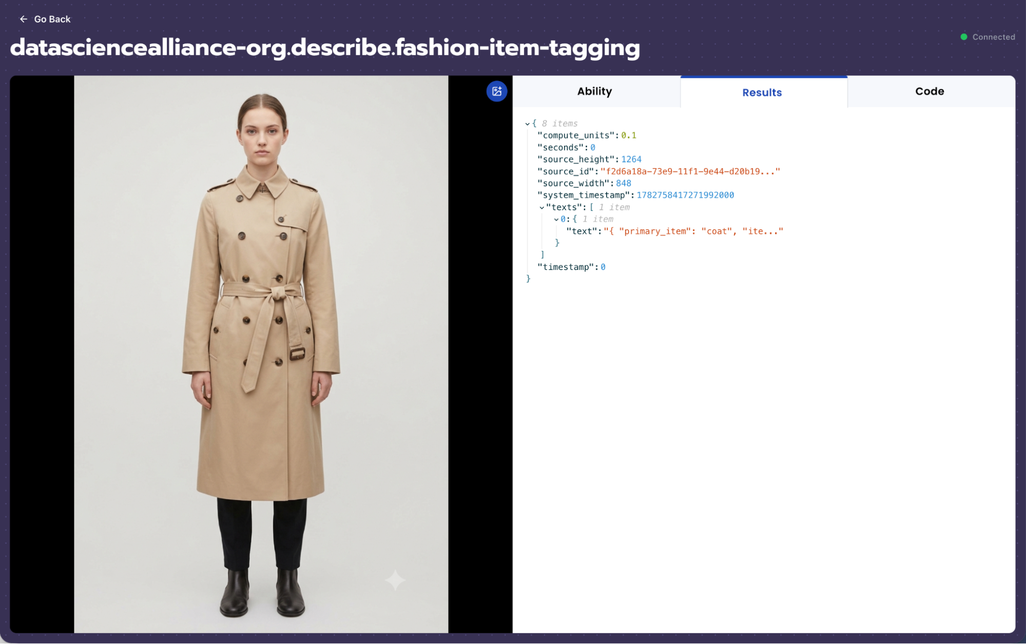 Beige trench coat on model with JSON results panel showing primary_item coat