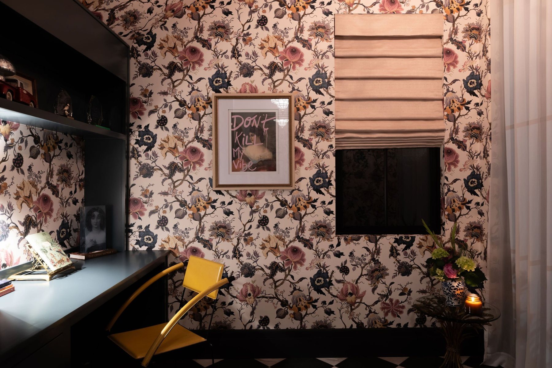 Office with floral wallpaper and lit built-in desk