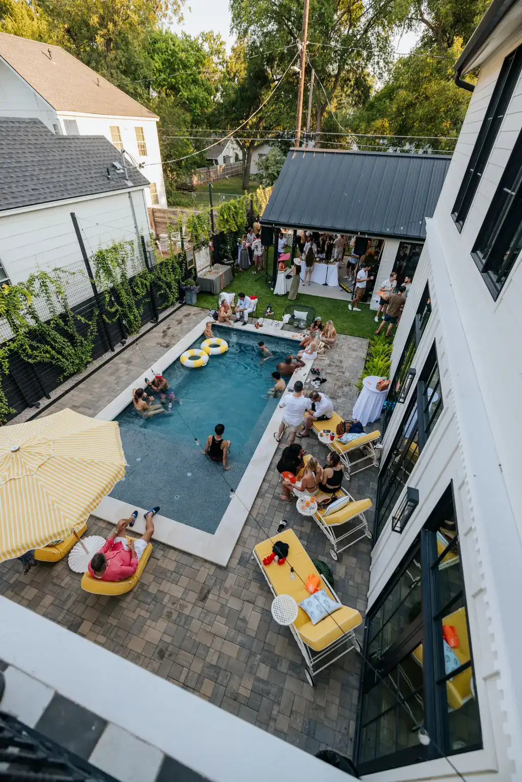 An afternoon gathering around the pool at Chateau Chloe