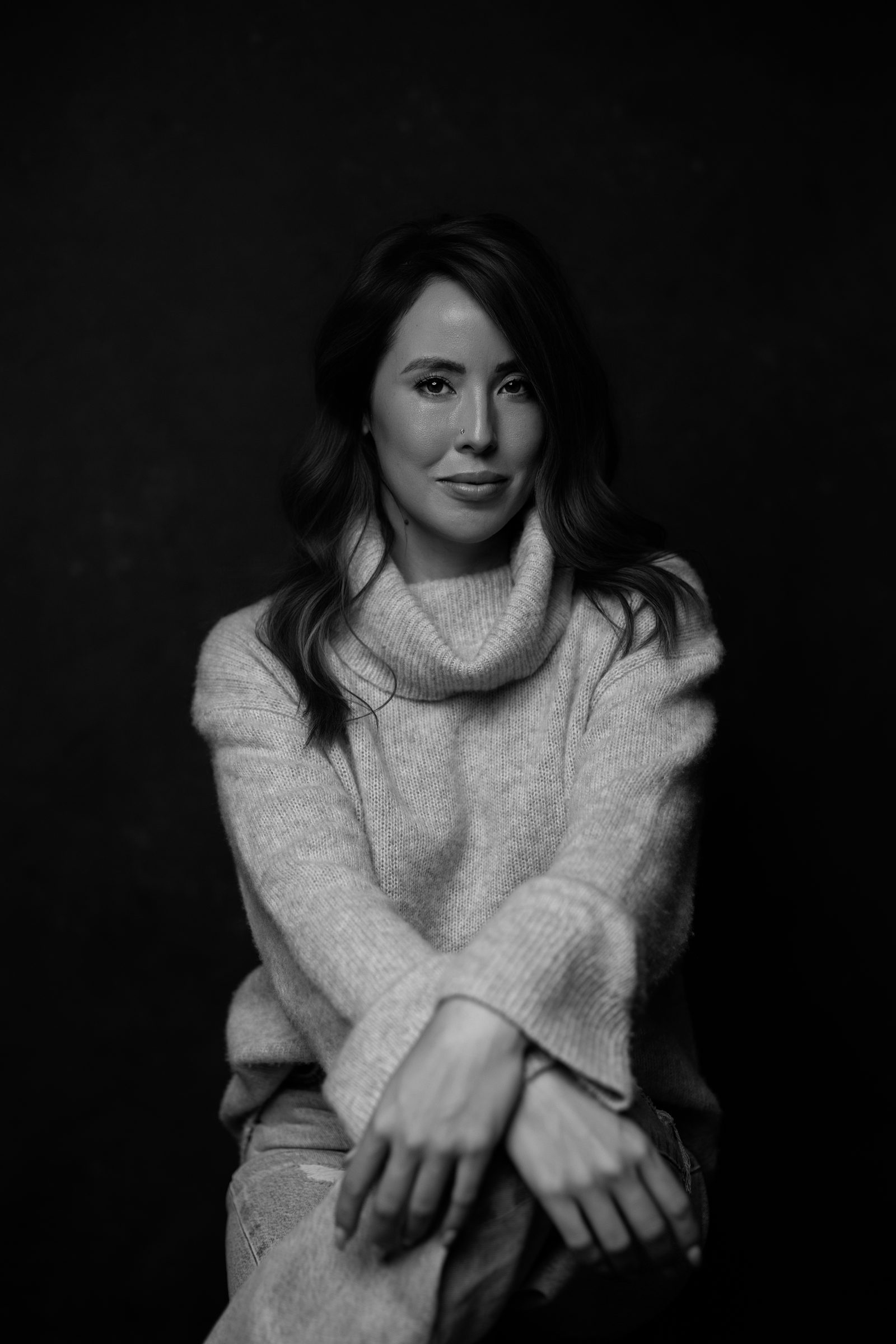 Chloe Chiang in a cream turtleneck sweater