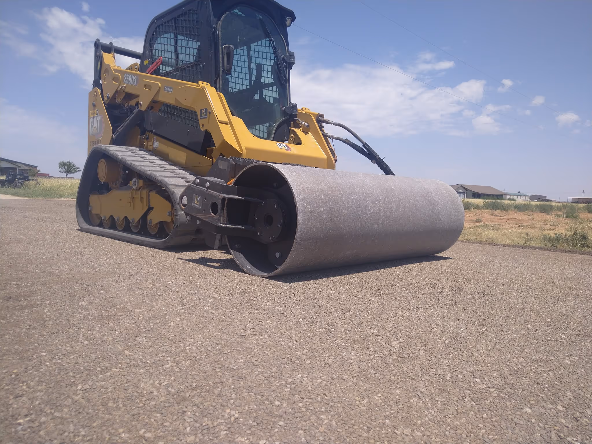 Parking lot construction by K3 Construction using a steam roller in Amarillo Texas