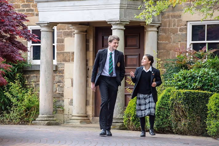 Oakham-School - MR4_1861 - Pupils-walking-outside-the-Queen-Elizabeth-Theatre.jpg