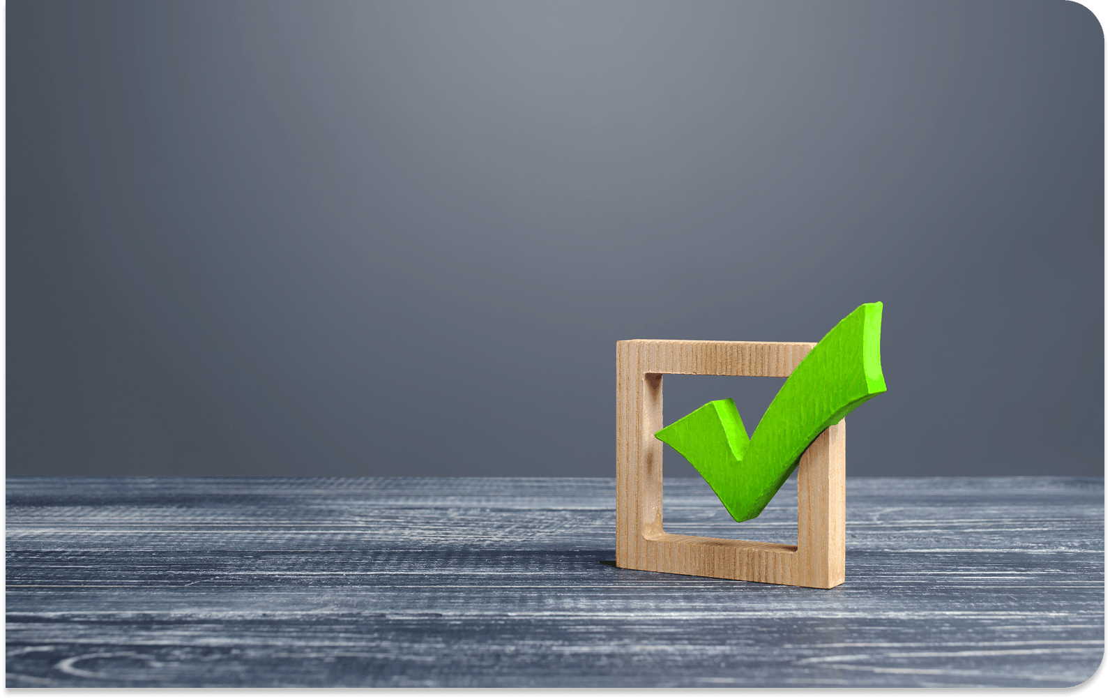 Hollow wooden block with a green checkmark in it