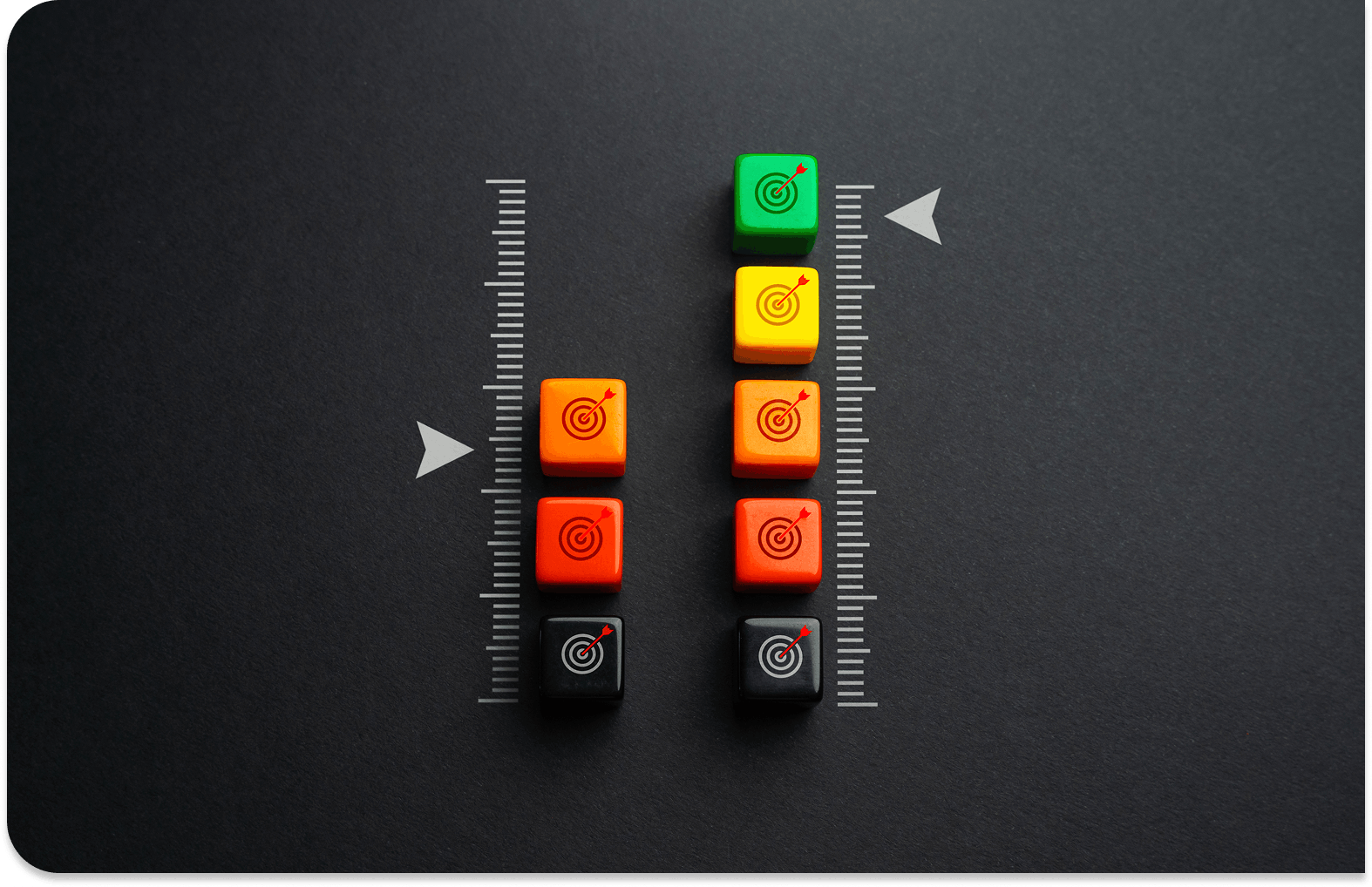 Dice with a target on them stacked on a guage symbolizing measuring your goals accurately 