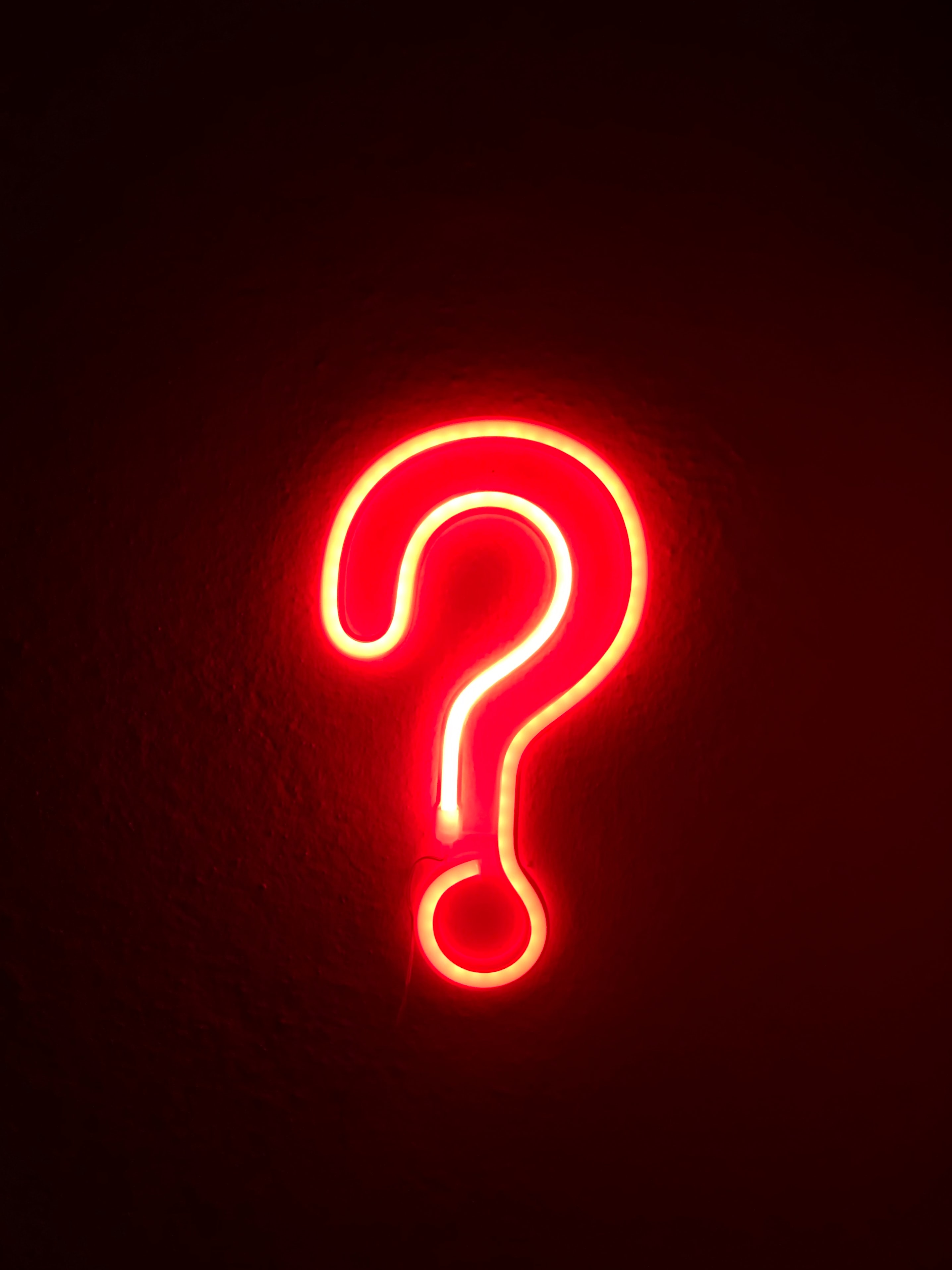 A neon question mark.