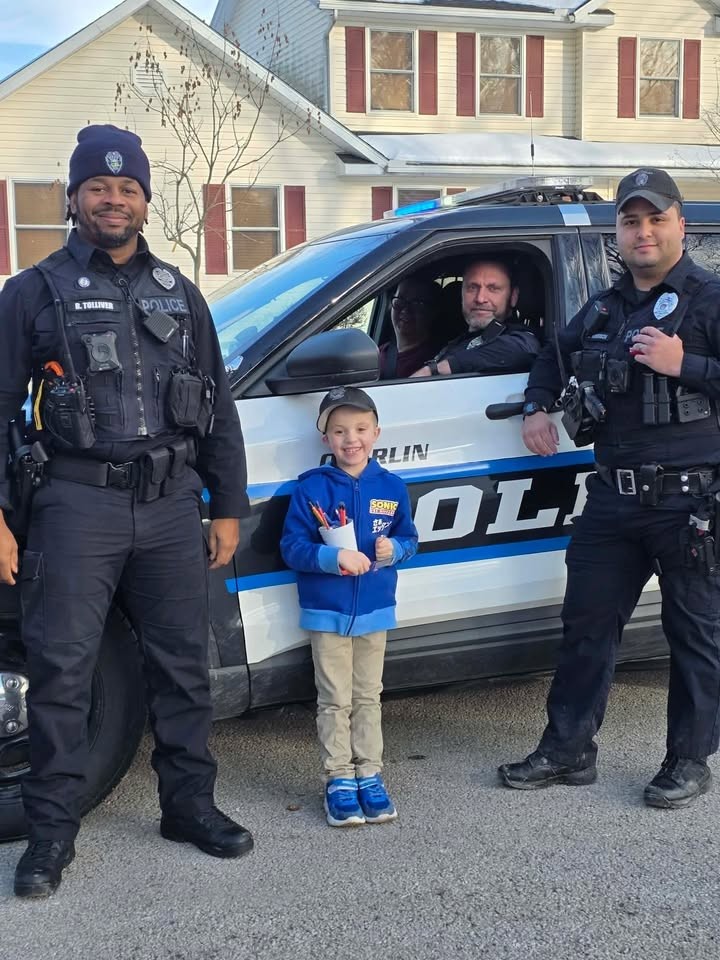 Ptl. Tolliver Ptl. Robinson Ptl Ellis with child