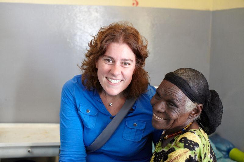 Photo of Kerry Pyror with a patient