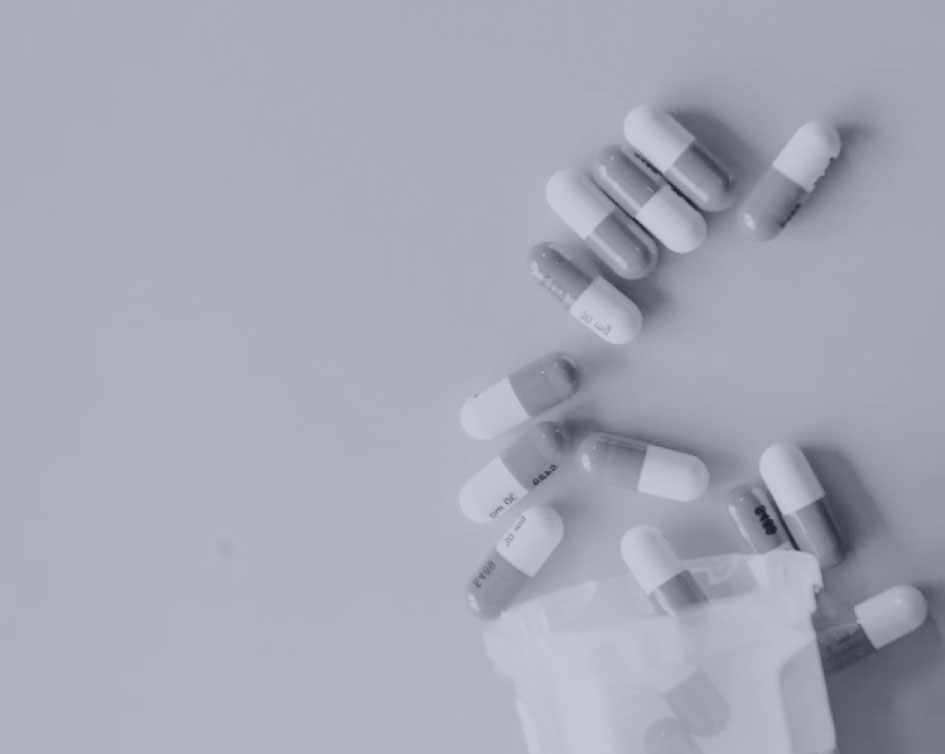 Pills spread in a table.
