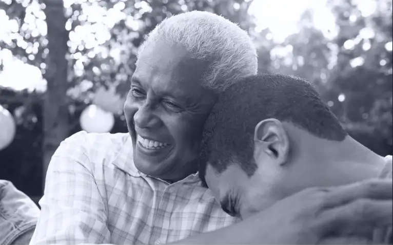 a father and son hugging