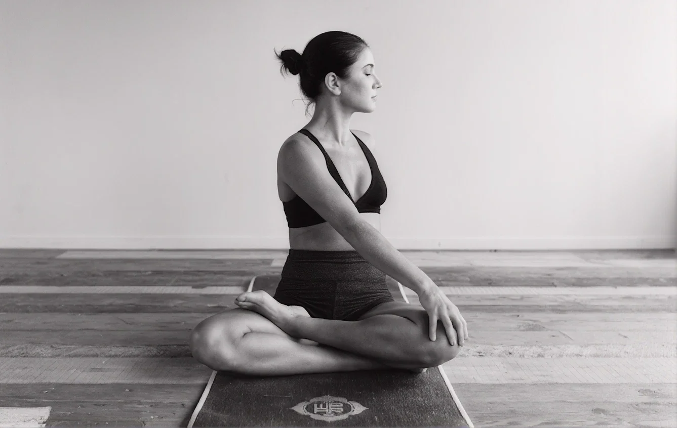 Woman meditating in a yoga pose