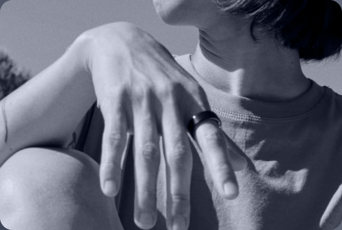 Person wearing a smart ring on their hand