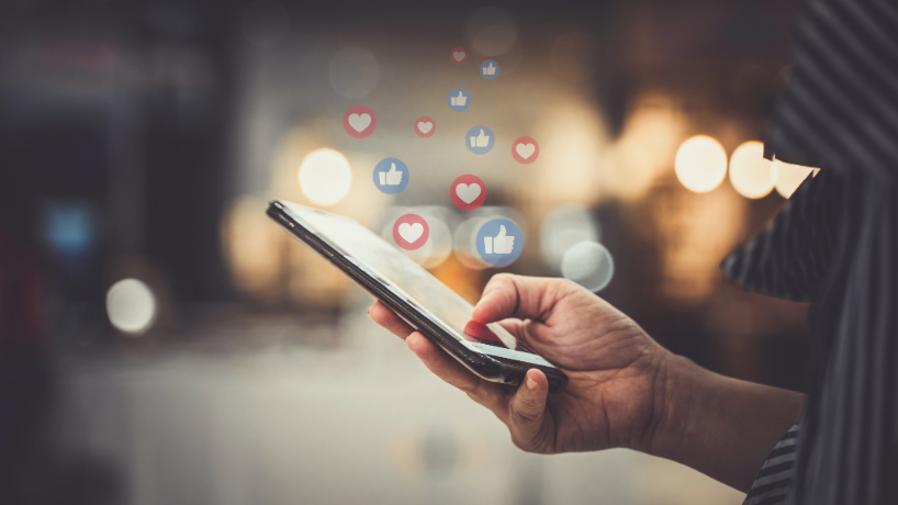 Image of a person holding a smartphone