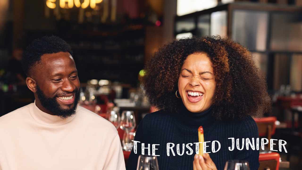 A couple eating and laughing