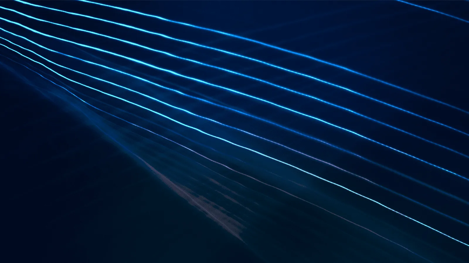 A large burst of colors ranging from blue to pink move in waves across a black background.