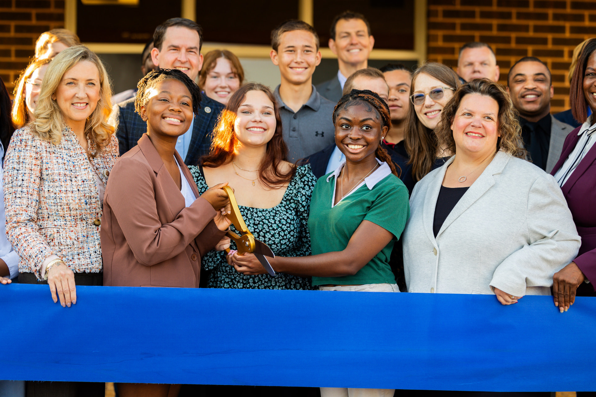 Students and Madison partners at a North Stafford High School ribbon cutting