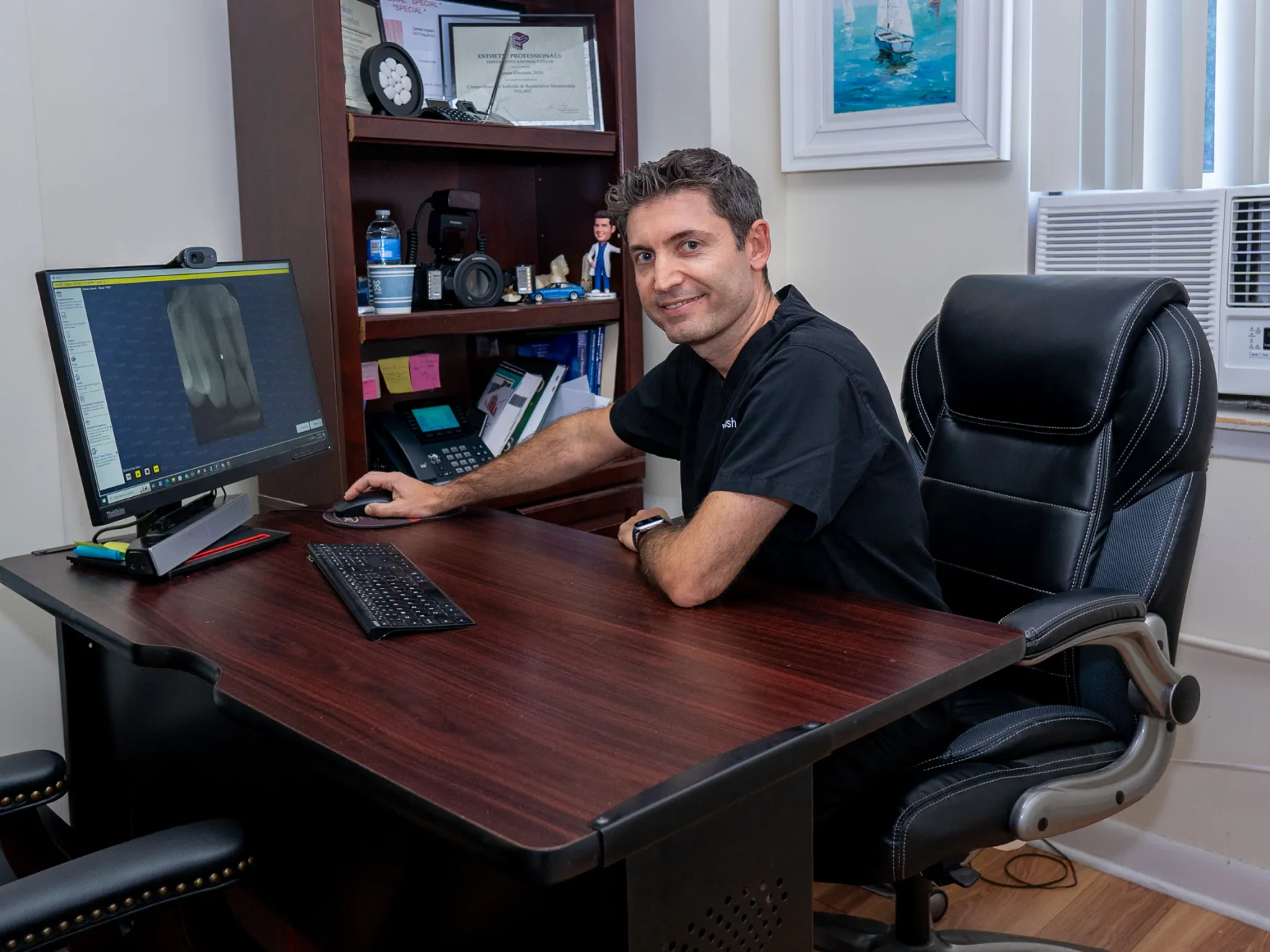 Dr. Khodosh checking X-ray images