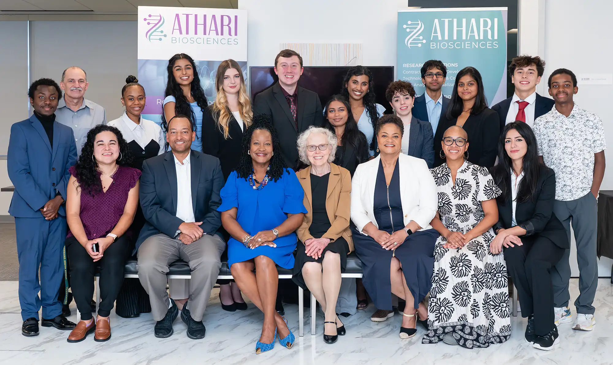 group photo of staff and interns at an Athari Biosciences graduation event