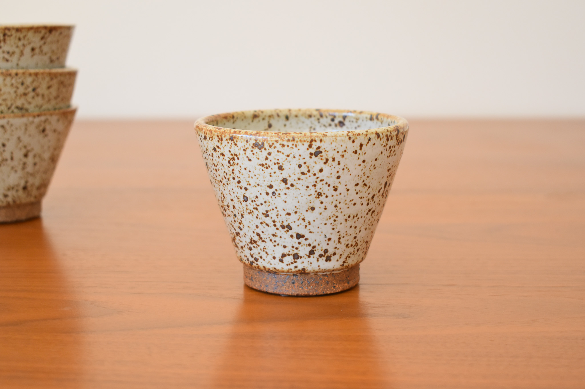 Glazed stoneware. Holds 8-10 fl oz. Measure 4" wide x 3" tall. These are perf for all bevs hot and cold!