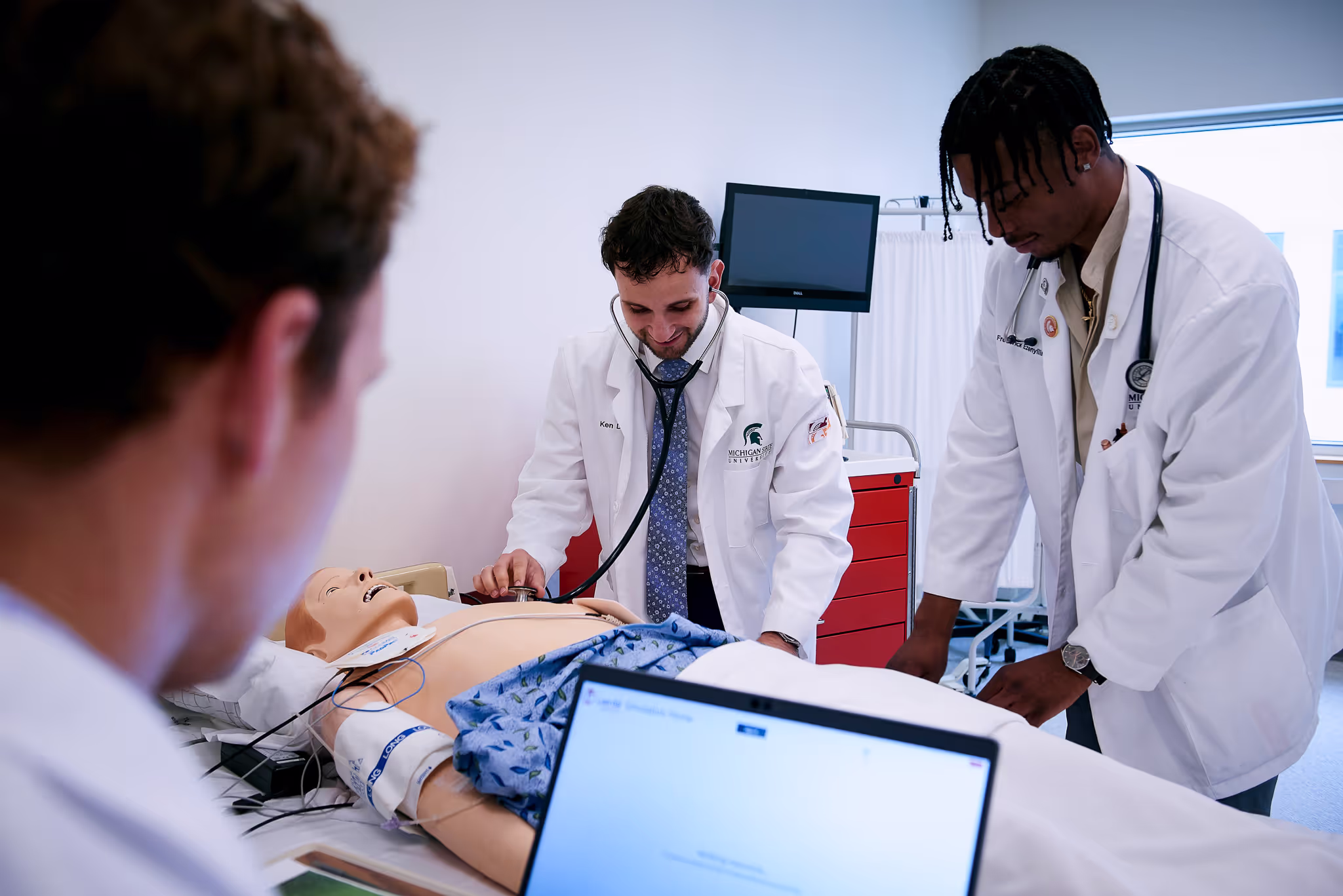 College of Human Medicine students work together. 