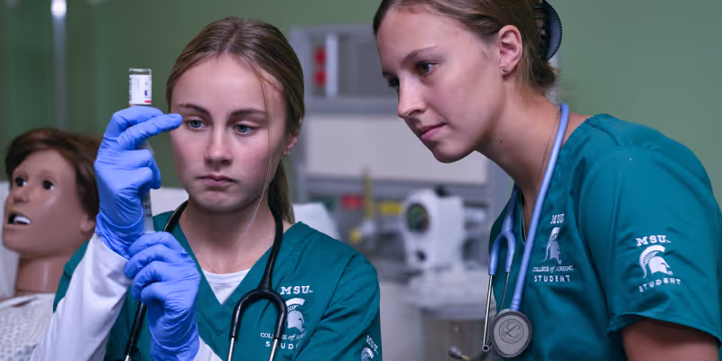 Nursing students work in Nursing Sim Lab.