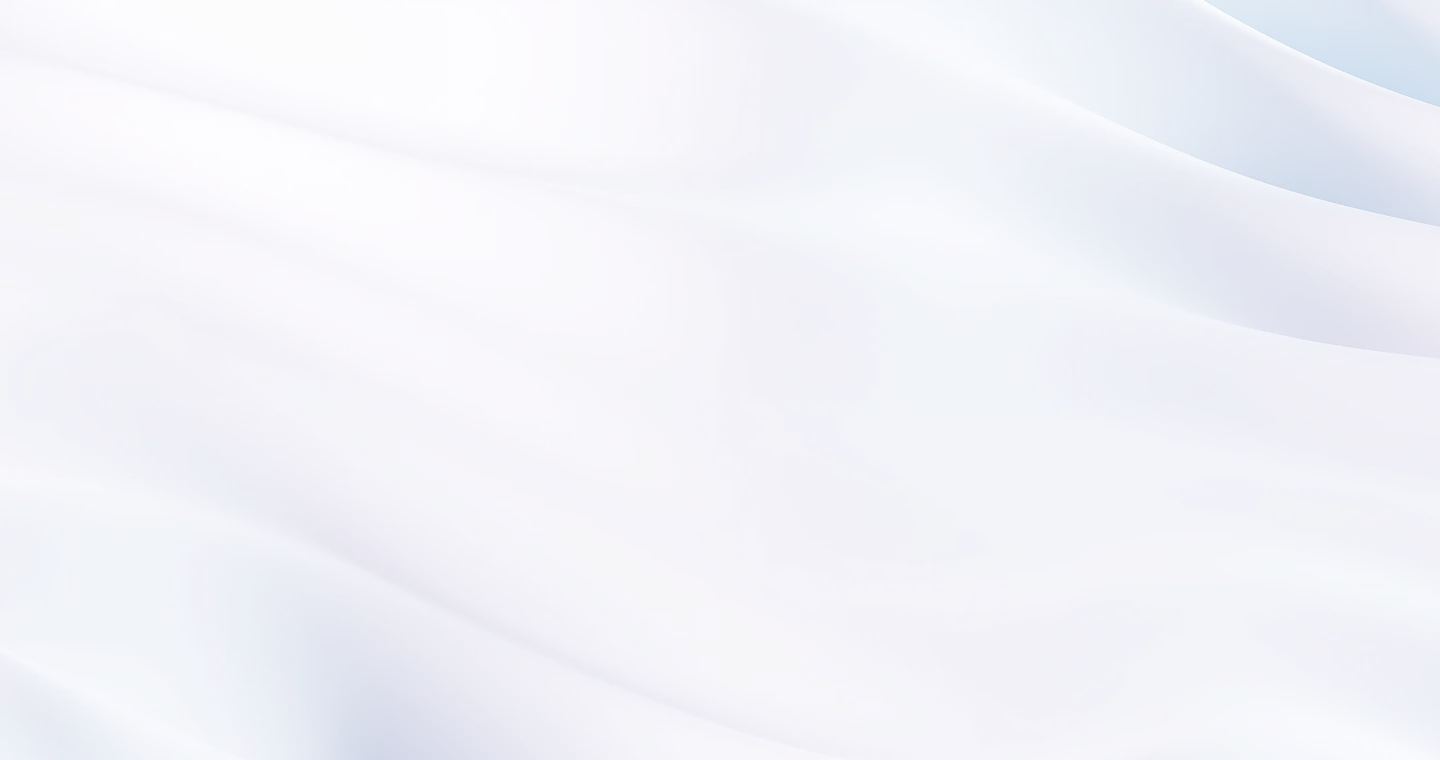 Soft, flowing white fabric with gentle folds and subtle blue-gray shadows.