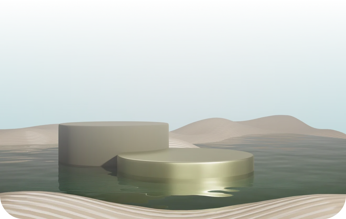 Two metallic cylindrical podiums partially submerged in calm water with wavy wooden patterns and soft brown hills under a pale blue sky.