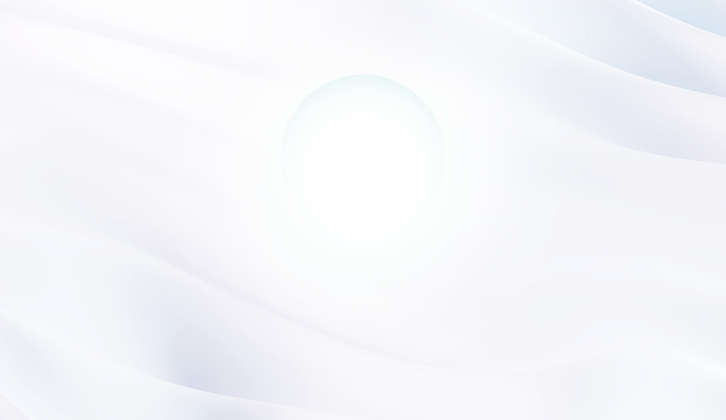 A teal translucent sphere with highlights hovering over a smooth, flowing white fabric background.