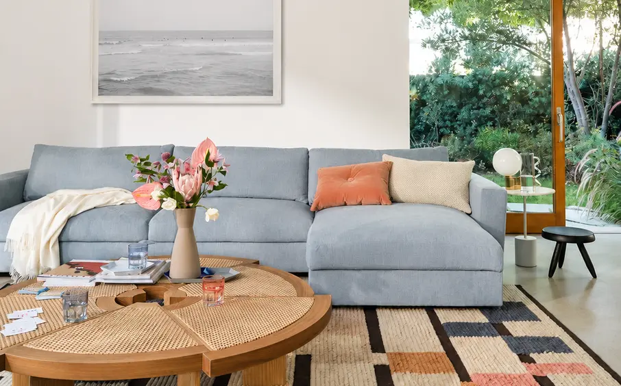 Living room styled for viewings with sofa and coffee table