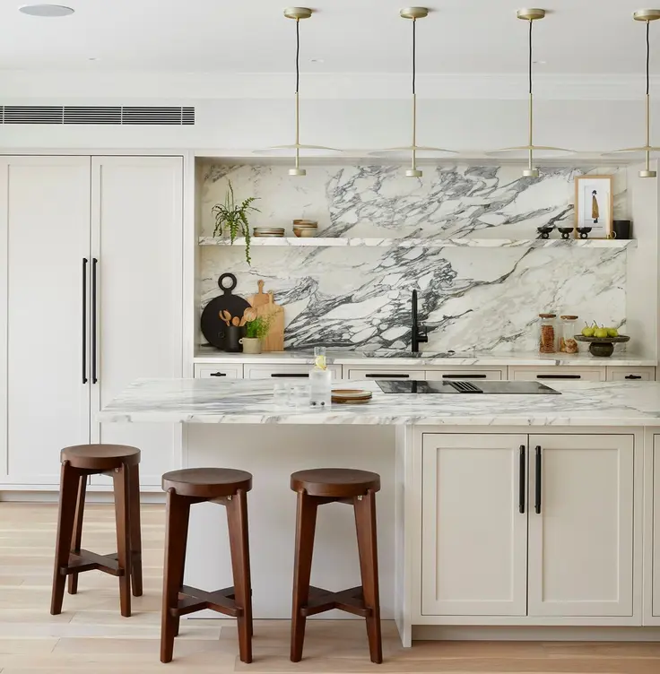 Marble kitchen island with bar stools