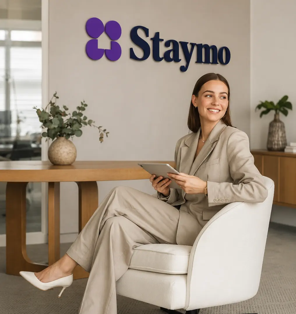 Staymo advisor seated in a bright living room