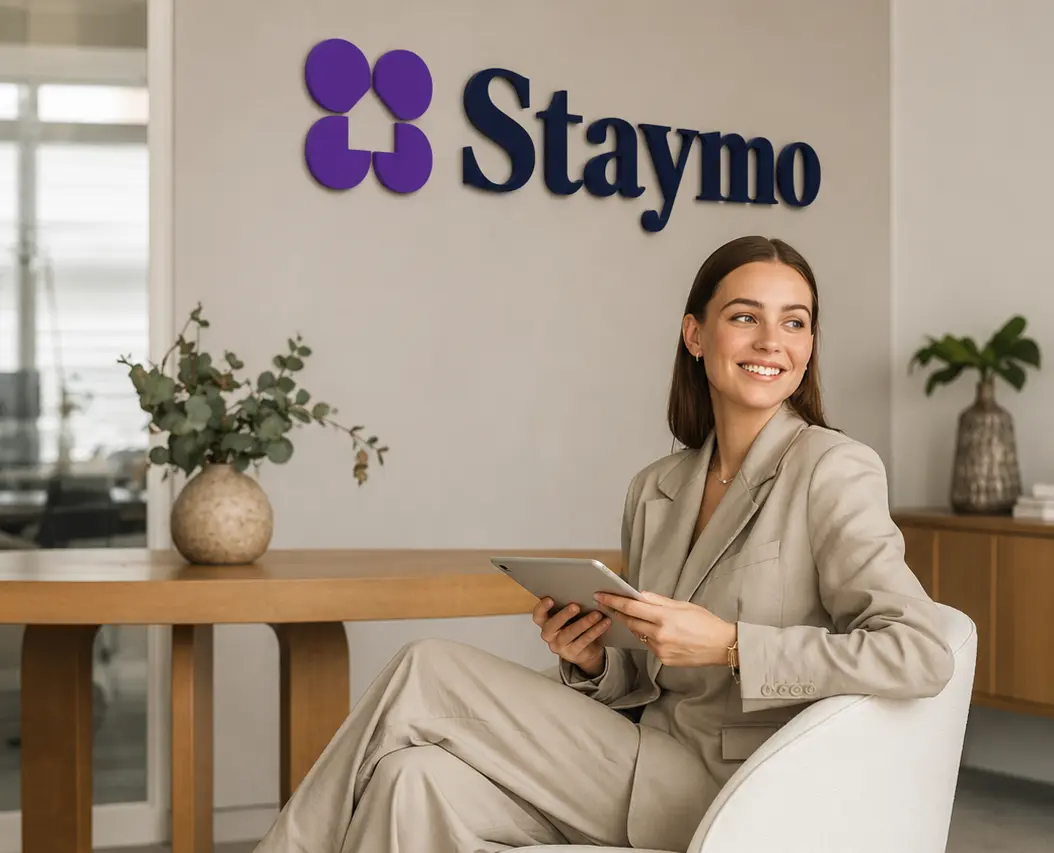 Staymo listing manager working in the office