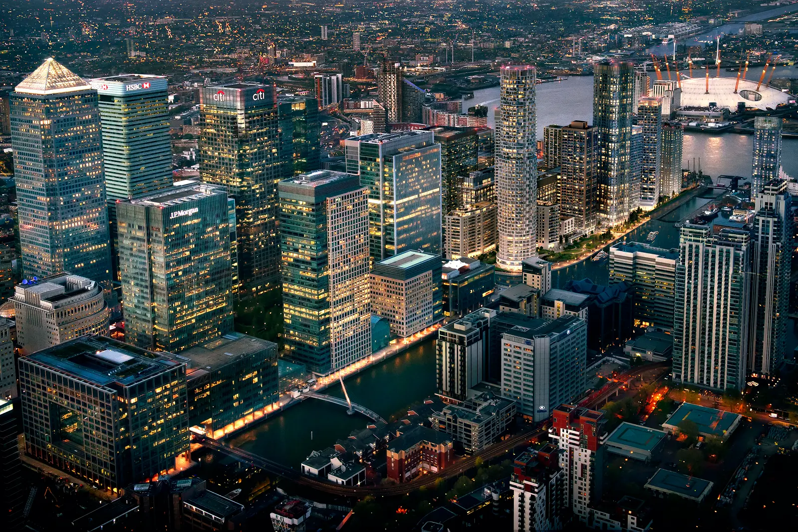 London skyline across Canary Wharf and the City at dusk