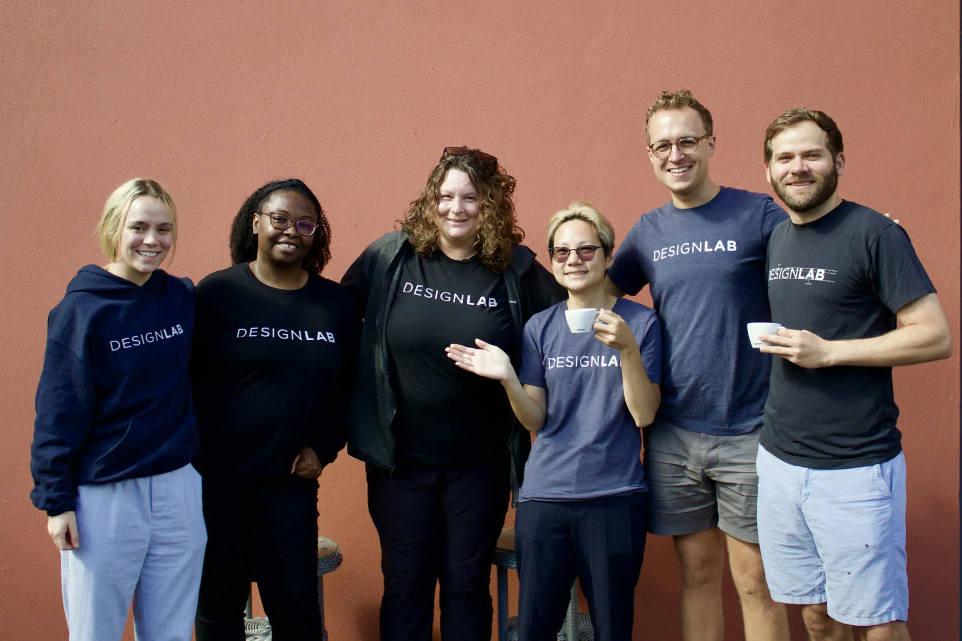 A photo of some Designlab team members wearing matching shirts