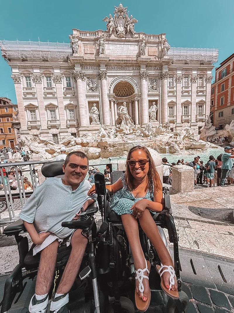 Jordan Dickey and Natalie Russo-Dickey in front of the Trevi Fountain in Italy