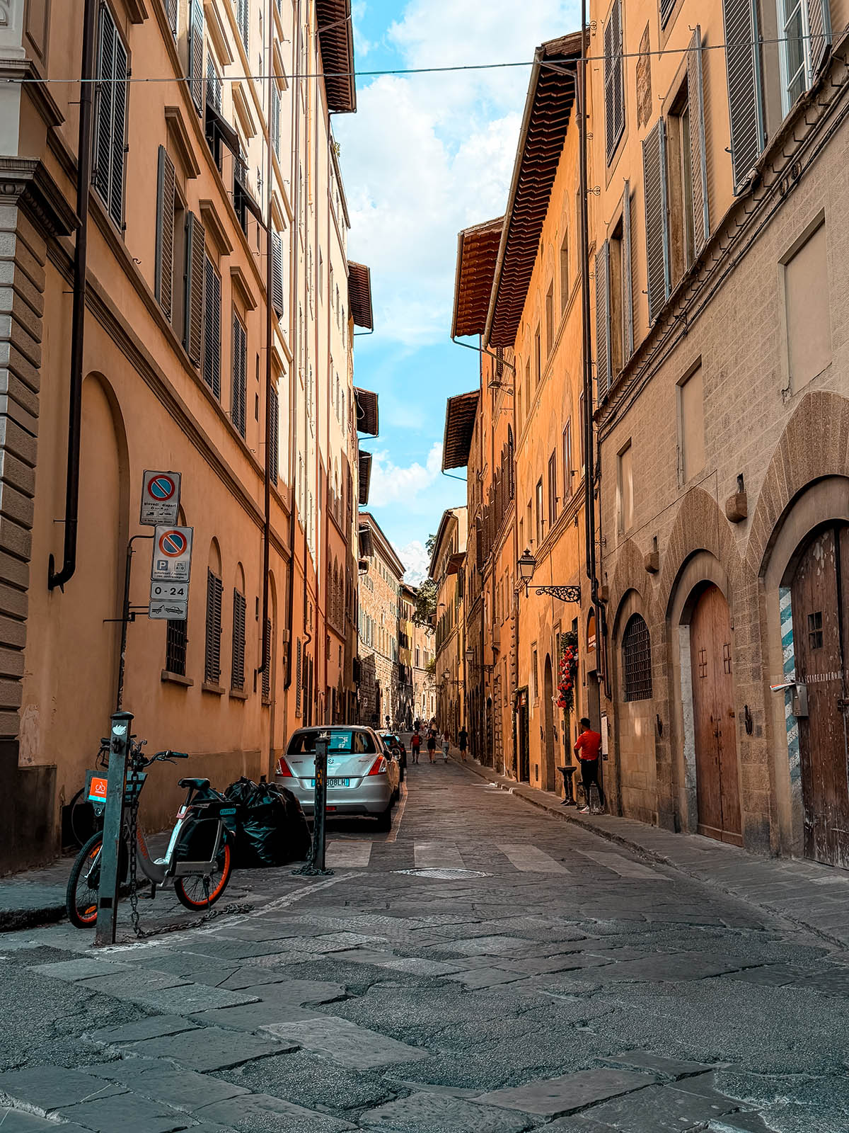 Rough cobblestone street in Florence showing uneven terrain