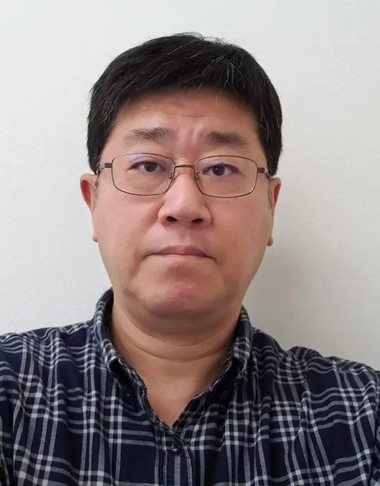 静岡市教職員組合書記長の長澤さん＝本人提供