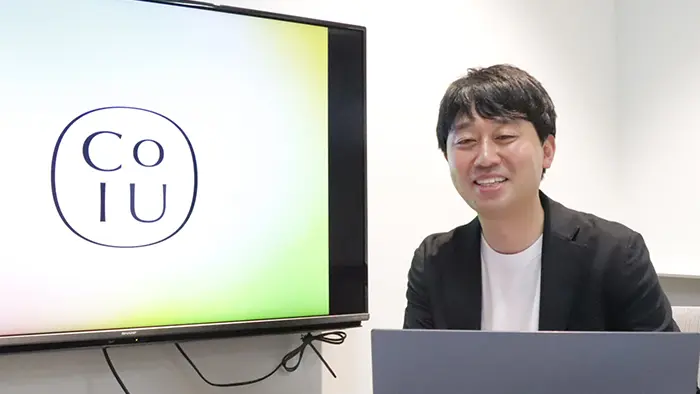 CoIUの理念を語る井上さん＝撮影：水野拓昌