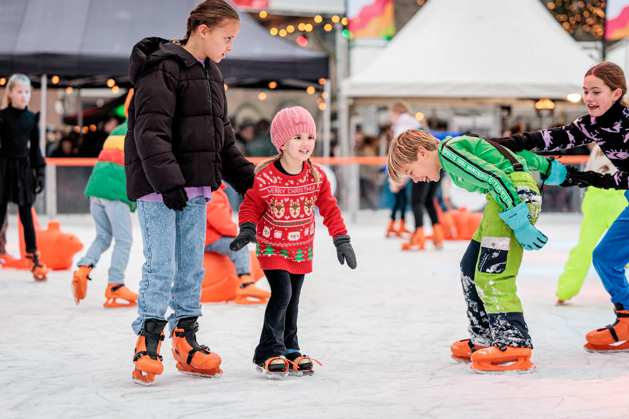 Kids having fun on the ice track