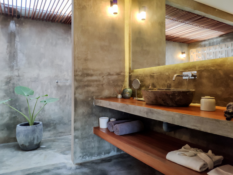 Luxury bathroom with a monstera plant in a villa, Bali 